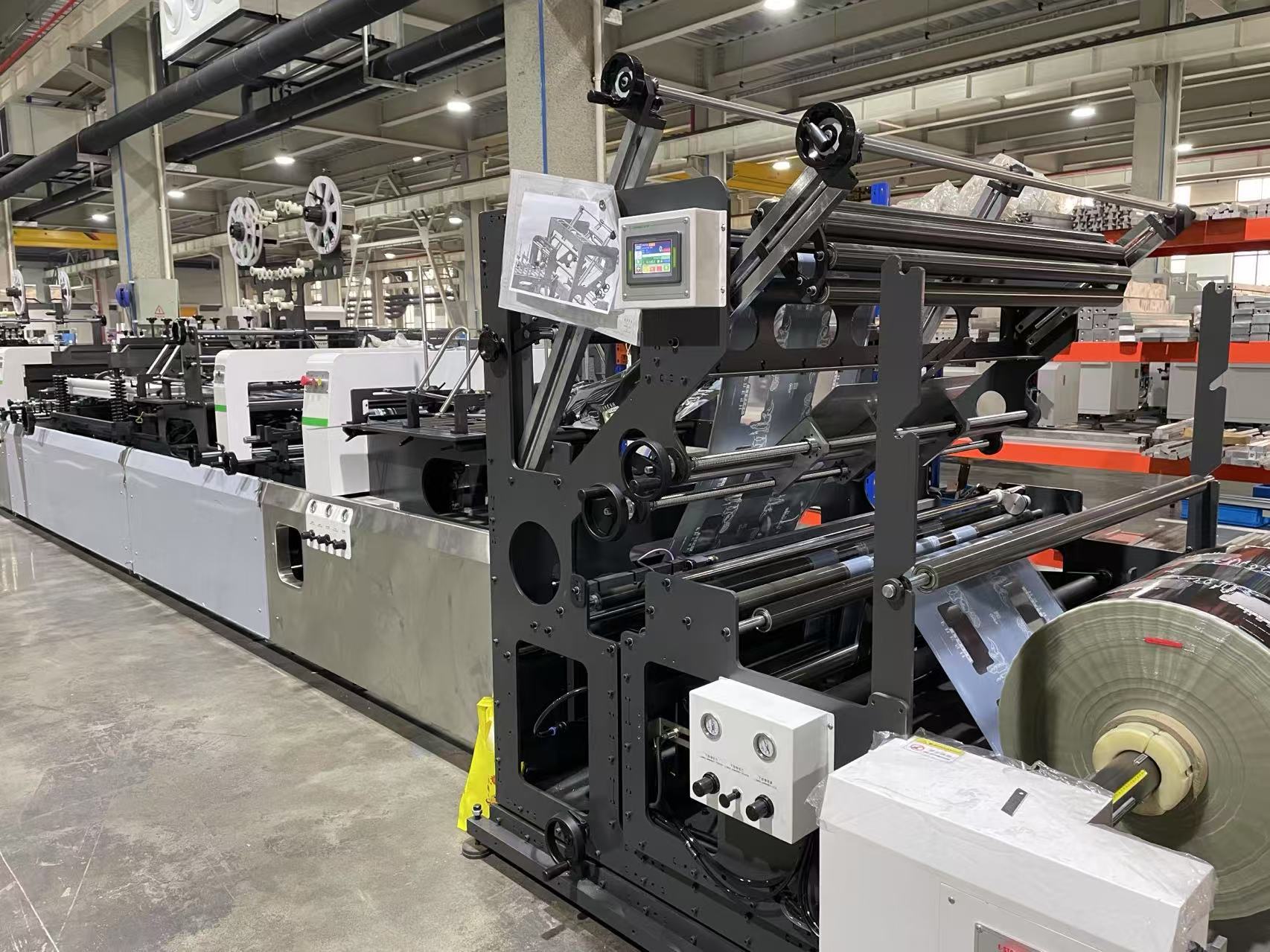 Máquina de fabricación de bolsas de sello central/cuádruple de alta velocidad